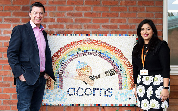 Chris Guillaume Open GI CEO with Acorns Natalia Solanki Open GI's CEO Chris Guillaume (L) with Acorns' Natalia Solanki (R) announcing the new charity partnership