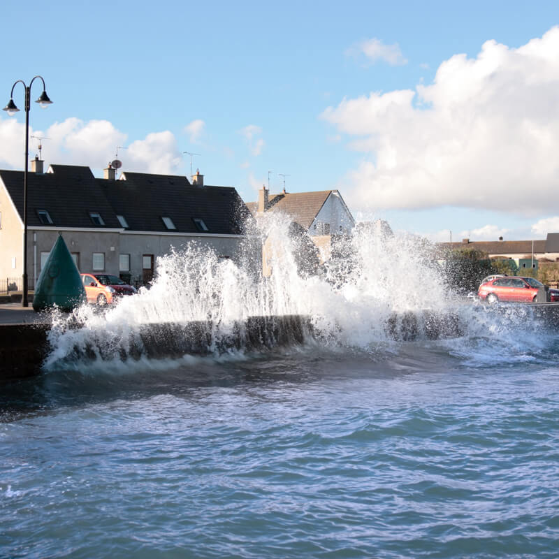 Houses on windy seafront – Gamma Climate Change Houses on windy seafront - Gamma Climate Change and Property Insurance