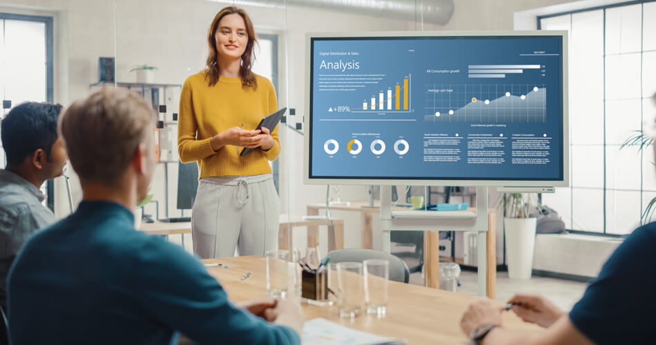 Inspired by digital analysis Lady stood at analysis board - Inspired by digital