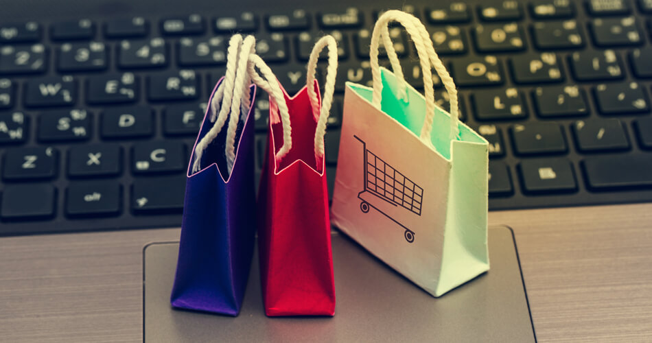 Small shopping bags on keyboard - Inspired by digital