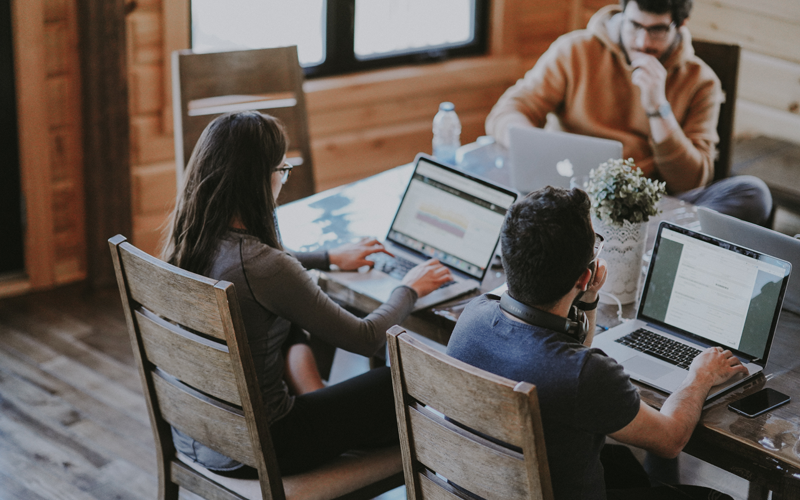 People-sat-at-laptops-at-desk